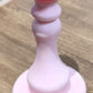 Pink rubber washing machine door holder featuring strong suction cup
