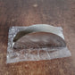 Stainless steel tissue napkin holder featuring modern design