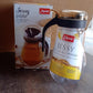 Oil and juice pourer bottle for spill-free liquid dispensing