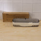 Installation perspective of transparent bathroom wall shelf