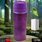 Sleek stainless steel sipper bottle on a wooden surface, ready for use.