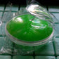 Compact silicone head massager, perfect for travel and daily use.
