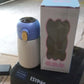 Detailed view of the smart water bottle's LED display and ergonomic design.