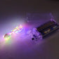 Battery powered waterproof copper wire string fairy lights illuminating outdoor space.