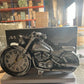 Motorcycle alarm clock lifestyle image on desk in home setting