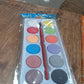 Close-up of a watercolor kit box, featuring product details and branding.