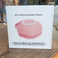 Silicone massage bath body brush featuring soft bristles and an easy-to-use shampoo dispenser.