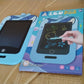 Kids LCD writing tablet showing pressure sensitivity on screen