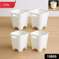 Plastic waste paper basket set used in a clean, modern home office setting.