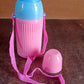 Travel-friendly kid's water bottle with adjustable strap.
