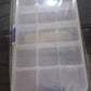 Open clear jewellery organizer box with adjustable dividers, demonstrating its spacious and flexible design.
