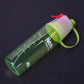 Athlete using the spray water bottle during a gym workout to stay refreshed and hydrated.