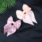 Additional satin bow hair clip featuring double tail and clip detail