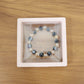 Lifestyle image of Dual-Tone Crystal Beaded Stretch Bracelet worn on wrist