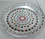 Elegant silver plated pooja thali, perfect for Indian traditional worship and ceremonies.