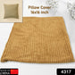 Close-up view of the plush corduroy fabric texture on a decorative cushion cover.