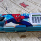 Detailed view of the kids' stationery box with multiple compartments and a calculator.