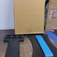 Multi-level back stretcher posture corrector device neatly packaged, ready for secure shipping.