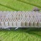 Shoe cleaning brush being used on leather footwear