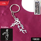 Close-up of spiritual Krishna flute shaped metal keyring
