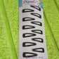 Close-up of the metal construction and smooth finish of the Tic Tac hair clips.