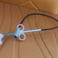 Detailed view of the multi-tooth claw on the Drain Cleaner Tool for effective blockage removal.