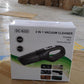 Velvet Wheels portable vacuum cleaner highlighting its compact size and accessories.