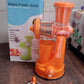 Packaging of the Quickslice Manual Fruit Juicer with all included accessories.