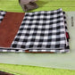 Detailed view of the durable and soft fabric of the leather and cotton pillow cover.