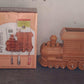 Detailed shot of the plastic train engine design key holder.