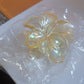 Side view of durable plastic hair clamp with simple design