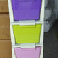 Vertical view of the multi-colored modular drawer storage system, highlighting its layers.