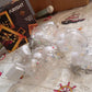 Wish Ball LED string lights glowing in the dark, perfect for festival lighting.