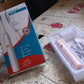 Detailed view of the Electric Toothbrush head, showing bristles and tongue cleaner.