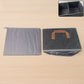 Storage box with handles filled with clothes for easy portability and organization