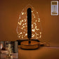 Golden crystal leaf-shaped LED table lamp showcasing crystal and gold flakes design