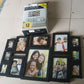 Close view of black photo frame set protecting artwork with acrylic fronts