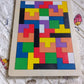 Abstract geometric pattern with colorful shapes, representing creative play possibilities.