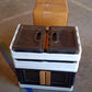 Collapsible plastic storage box folded flat for space-saving storage