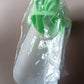 Silver bathroom faucet fitted with a practical silicone kids faucet extender.