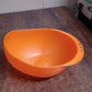 Detailed interior view of the efficient plastic rice washing bowl.