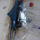 The 2-in-1 long handle cleaning brush efficiently cleaning a bathroom floor.