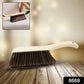 Effective bed sheet duster cleaning brush removing dust and lint from delicate bedding.