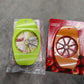 Multiple Ganesh Apple Cutters in various colors, ready for use.
