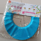 Neutral image showcasing adjustable baby shower cap colors and design