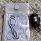 Mini RGB LED strobe light discreetly mounted on a bike frame for enhanced safety.