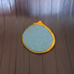 Dishwashing sponge brush placed in kitchen setting ready for use