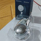 Close-up component view of portable electric shaver blades and cutter head