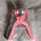 Multiple eyelets and the eyelet pliers demonstrating their versatility on different fabrics.