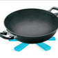 Portable foldable hotmat protecting a dining table from a serving dish.